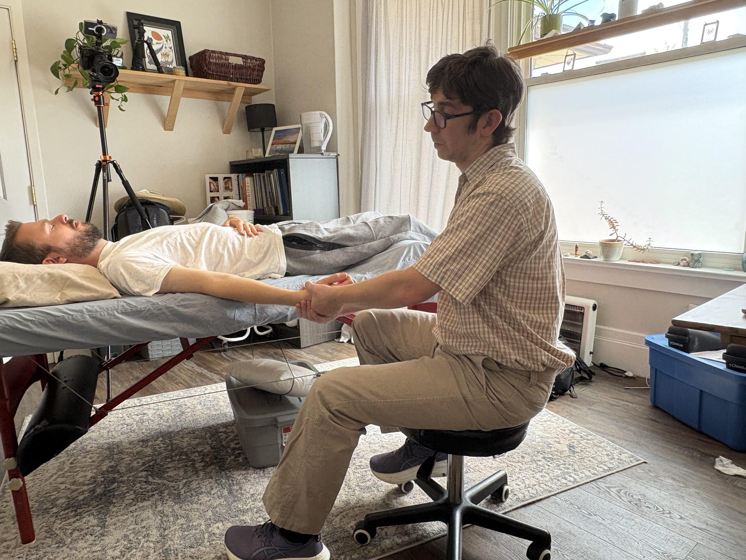 This is me using a arm pull technique to release heat within this clients nervous system